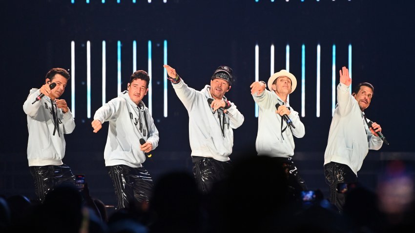 ATLANTA, GEORGIA – JULY 07:  (L-R) Jonathan Knight, Jordan Knight, Donnie Wahlberg, Joey McIntire, and Danny Wood of New Kids on the Block perform onstage during “The Mixtape” tour at State Farm Arena on July 07, 2022 in Atlanta, Georgia. (Photo by Paras Griffin/Getty Images)