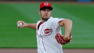 Sep 23, 2020; Cincinnati, Ohio, USA; Cincinnati Reds starting pitcher Trevor Bauer (27) throws against the Milwaukee Brewers during the first inning at Great American Ball Park. Mandatory Credit: David Kohl-USA TODAY Sports