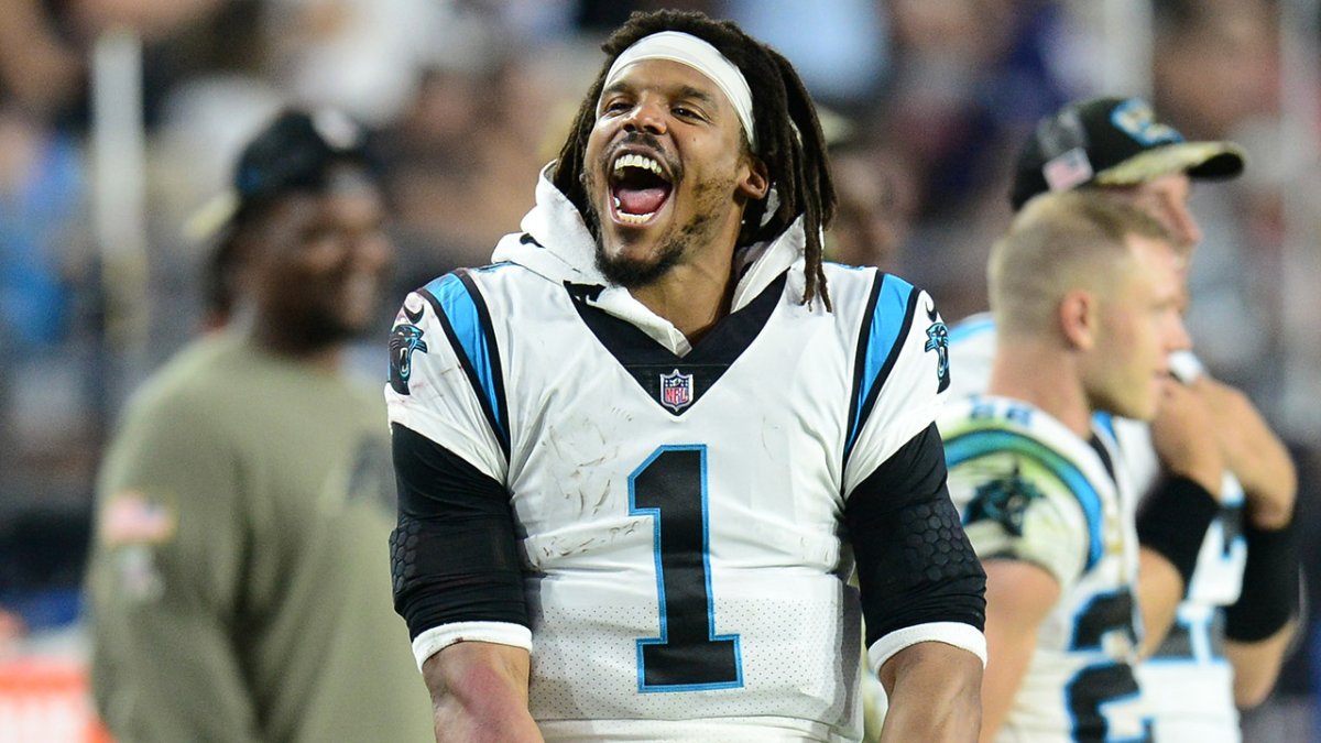 Carolina Panthers' Cam Newton (1) applauds after a play during the