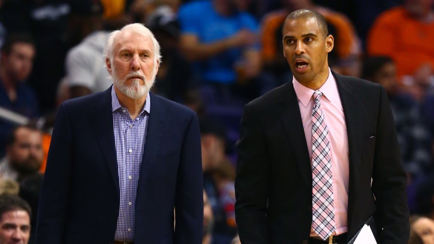 Dec 15, 2016; Phoenix, AZ, USA; San Antonio Spurs head coach Gregg Popovich (left) and assistant coach Ime Udoka against the Phoenix Suns at Talking Stick Resort Arena. The Spurs defeated the Suns 107-92. Mandatory Credit: Mark J. Rebilas-USA TODAY Sports