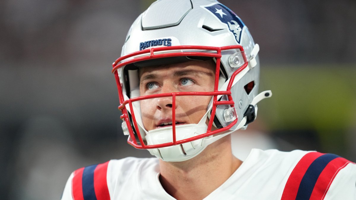 Josh Allen wearing a Bills Ryan Fitzpatrick jersey during pregame