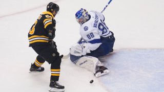 Aug 29, 2020; Toronto, Ontario, CAN; Tampa Bay Lightning goaltender Andrei Vasilevskiy (88) makes a save against Boston Bruins left wing Brad Marchand (63) during the second period in game four of the second round of the 2020 Stanley Cup Playoffs at Scotiabank Arena. Mandatory Credit: John E. Sokolowski-USA TODAY Sports