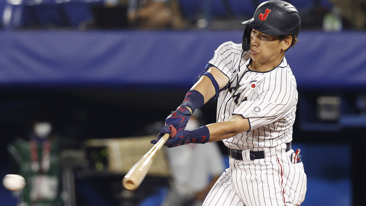 Masataka Yoshida of the Boston Red Sox reacts after hitting a two