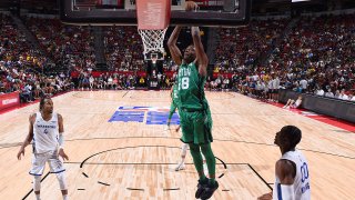 LAS VEGAS, NV – JULY 12: Mfiondu Kabengele #28 of the Boston Celtics drives to the basket during the game against the Golden State Warriors during the 2022 Las Vegas Summer League on July 12, 2022 at the Thomas & Mack Center in Las Vegas, Nevada NOTE TO USER: User expressly acknowledges and agrees that, by downloading and/or using this Photograph, user is consenting to the terms and conditions of the Getty Images License Agreement. Mandatory Copyright Notice: Copyright 2022 NBAE (Photo by Garrett Ellwood/NBAE via Getty Images)