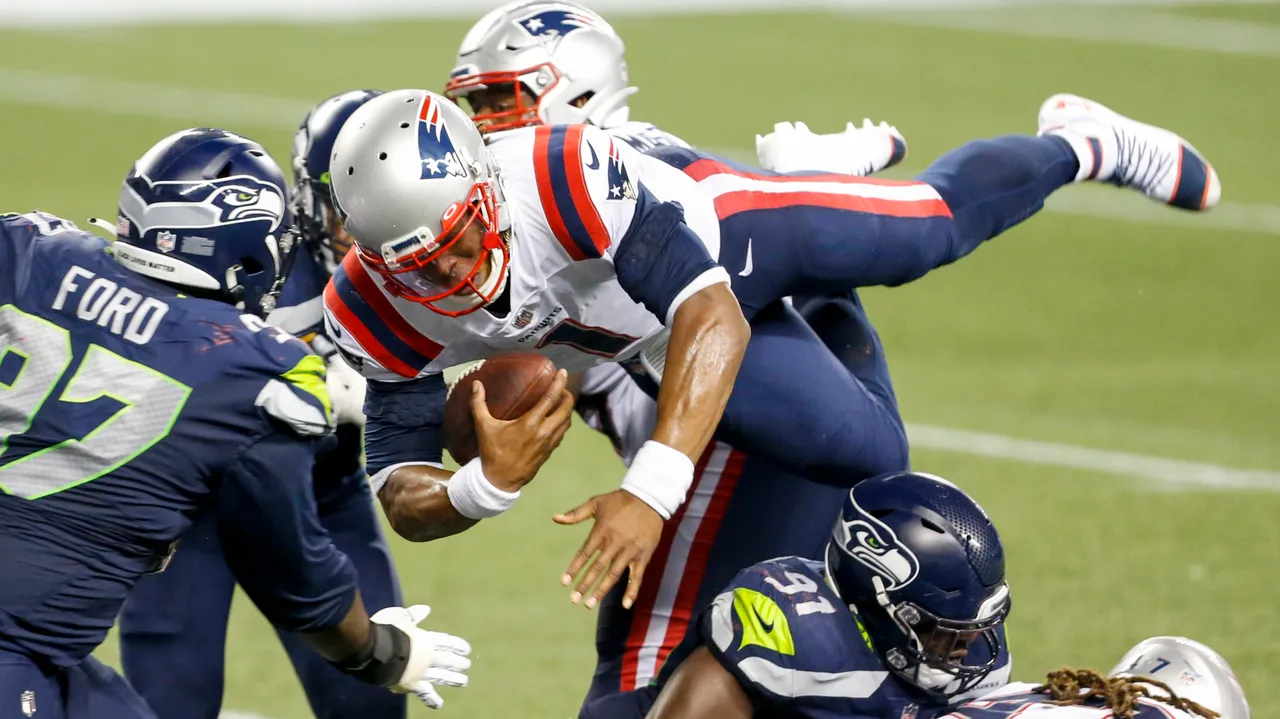 <p>The Seahawks tried like hell to make Cam Newton uncomfortable. They brought extra pressure on almost half of New England dropbacks -- 22 of 47 -- but the Patriots offensive line and backs did their part in keeping Newton clean. He was under pressure nine times and sacked just once -- though even the sack was a few inches away from going down as a Newton carry for positive yardage. The relentless Jamal Adams simply caught Newton from behind and brought him down right at the line of scrimmage.</p>
<p>This grade takes a hit for what happened in the Patriots run game when it was someone other than Newton holding the ball. Less than 2.0 yards per carry is a far cry from what they were able to do one week prior. And on the final play of the game, rookie offensive lineman Mike Onwenu lost his one-on-one battle with L.J. Collier, with Collier getting across Onwenu's face and into the backfield to stuff Newton. </p>