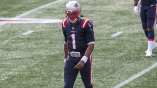 Sep 27, 2020; Foxborough, Massachusetts, USA; New England Patriots quarterback Cam Newton (1) reacts during the first half against the Las Vegas Raiders at Gillette Stadium. Mandatory Credit: Paul Rutherford-USA TODAY Sports