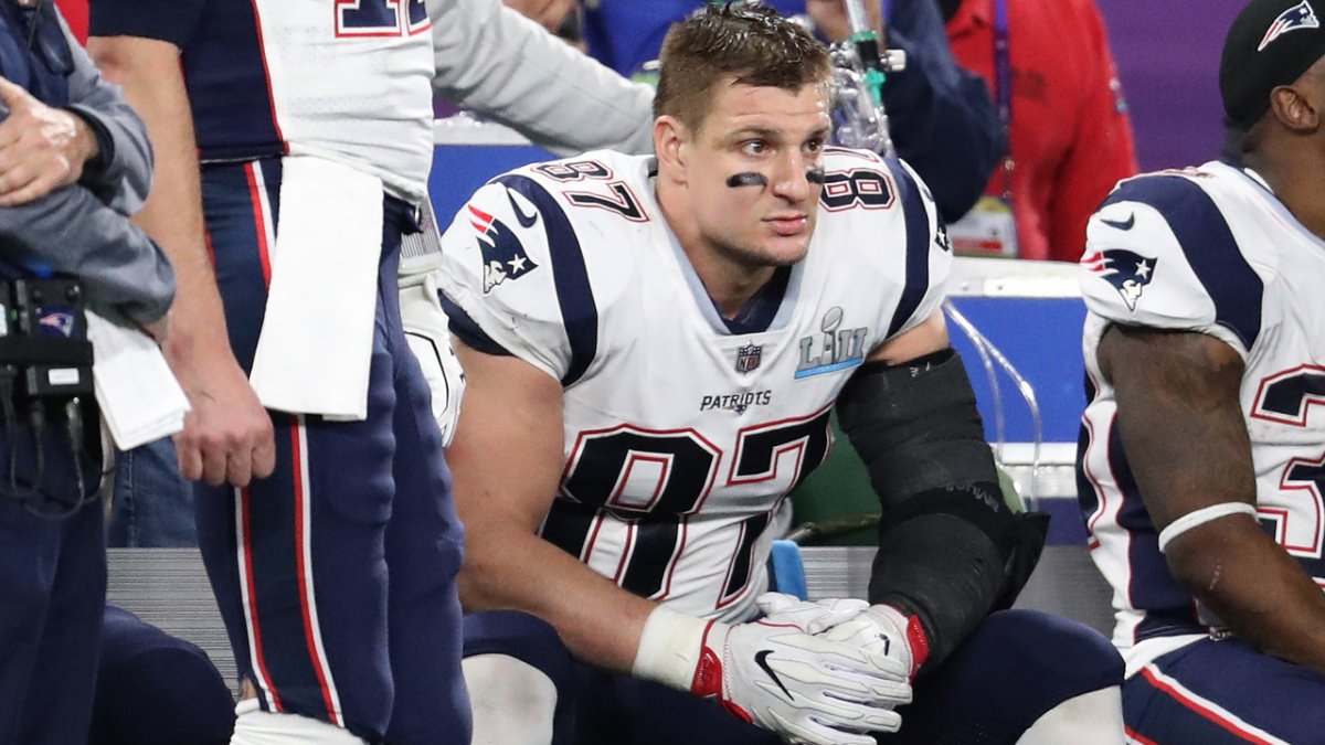 New England Patriots' Rob Gronkowski walks off the field after an