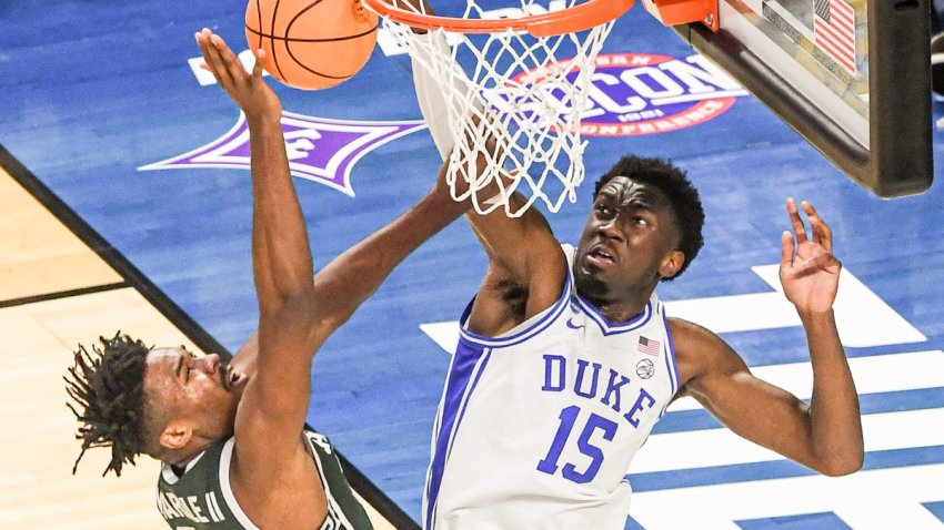 Duke University center Mark Williams (15) blocks the shot of Michigan State University forward Julius Marble II (34) during the first half of the NCAA Div. 1 Men’s Basketball Tournament preliminary round game at Bon Secours Wellness Arena in Greenville, S.C. Sunday, March 20, 2022. Ncaa Men S Basketball Second Round Duke Vs Michigan State
