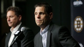 Boston Bruins head coach Bruce Cassidy, left, and general manager Don Sweeney, right, face reporters during a news conference, Thursday, May 10, 2018, in Boston. The Bruins were eliminated from the Stanley Cup playoffs by the Tampa Bay Lightning on Sunday. (AP Photo/Steven Senne)