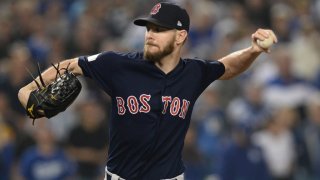 Oct 28, 2018; Los Angeles, CA, USA; Boston Red Sox pitcher Chris Sale (41) pitches in the ninth inning against the Los Angeles Dodgers in game five of the 2018 World Series at Dodger Stadium. Mandatory Credit: Gary A. Vasquez-USA TODAY Sports
