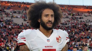 December 24, 2016; Los Angeles, CA, USA; San Francisco 49ers quarterback Colin Kaepernick (7) reacts following the 22-21 victory against the Los Angeles Rams at Los Angeles Memorial Coliseum. Mandatory Credit: Gary A. Vasquez-USA TODAY Sports