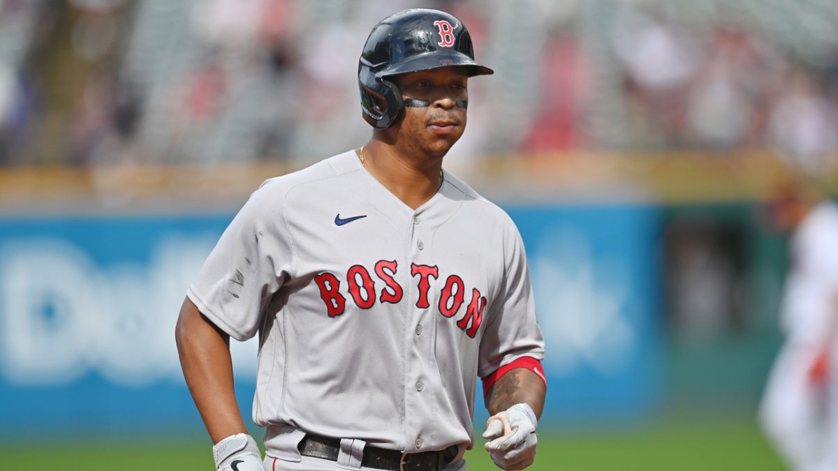 Rafael Devers stares down Cal Quantrill on his way back to the