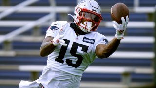 New England Patriots wide receiver N’Keal Harry catches a pass in a drill during an NFL football training camp practice, Tuesday, Aug. 25, 2020, in Foxborough, Mass. (AP Photo/Steven Senne, Pool)