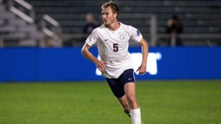 Virginia’s Henry Kessler (5) handles the ball during the NCAA college soccer championship against Georgetown in Cary, N.C., Sunday, Dec. 15, 2019. (AP Photo/Ben McKeown)