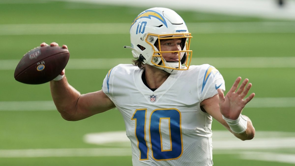 Los Angeles Chargers quarterback Justin Herbert (10) adjusts his