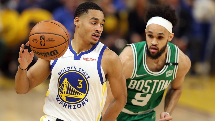 SAN FRANCISCO, CALIFORNIA – JUNE 02: Jordan Poole #3 of the Golden State Warriors dribbles past Derrick White #9 of the Boston Celtics during the first quarter in Game One of the 2022 NBA Finals at Chase Center on June 02, 2022 in San Francisco, California. NOTE TO USER: User expressly acknowledges and agrees that, by downloading and/or using this photograph, User is consenting to the terms and conditions of the Getty Images License Agreement. (Photo by Ezra Shaw/Getty Images)