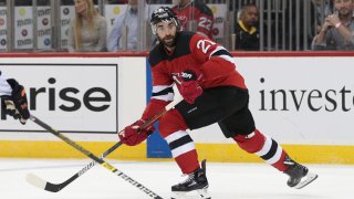 Oct 10, 2019; Newark, NJ, USA; New Jersey Devils center Kyle Palmieri (21) watches the puck during the first period against the Edmonton Oilers at Prudential Center. Mandatory Credit: Vincent Carchietta-USA TODAY Sports