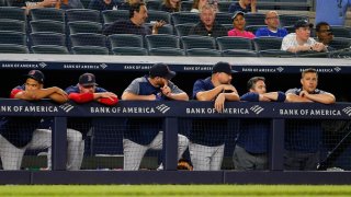 Aug 4, 2019; Bronx, NY, USA; The Boston Red Sox look on from the dugout against the New York Yankees during the ninth inning at Yankee Stadium. Mandatory Credit: Andy Marlin-USA TODAY Sports