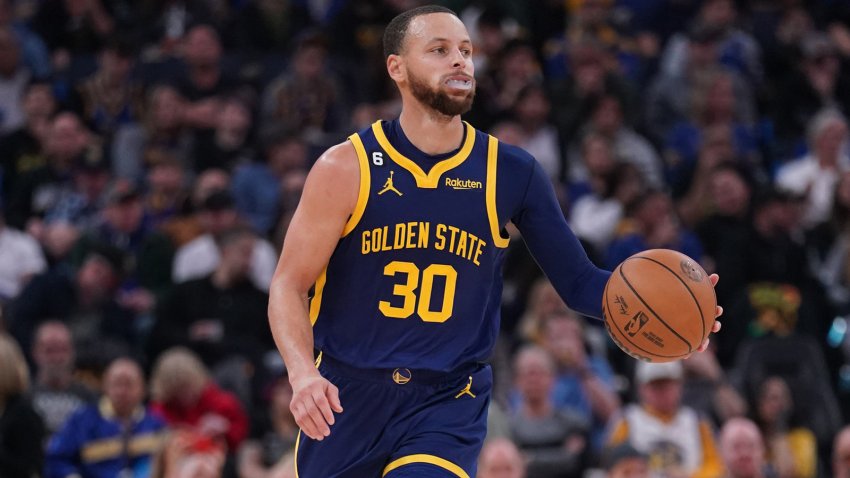 Feb 4, 2023; San Francisco, California, USA; Golden State Warriors guard Stephen Curry (30) dribbles the ball against the Dallas Mavericks in the third quarter at the Chase Center. Mandatory Credit: Cary Edmondson-USA TODAY Sports