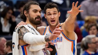 Jan 13, 2020; Minneapolis, Minnesota, USA; Oklahoma City Thunder center Steven Adams (12) and forward Danilo Gallinari (8) talk in the second quarter against Minnesota Timberwolves at Target Center. Mandatory Credit: Brad Rempel-USA TODAY Sports