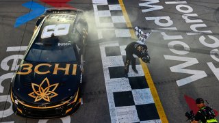 Kyle Busch, driver of the No. 8 3CHI Chevrolet, takes a bow after winning the NASCAR Cup Series Enjoy Illinois 300 at WWT Raceway on June 4, 2023 in Madison, Ill.