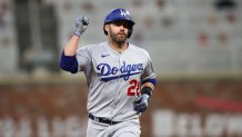 Los Angeles Dodgers designated hitter J.D. Martinez (28) celebrates after a home run against the Atlanta Braves in the seventh inning at Truist Park.