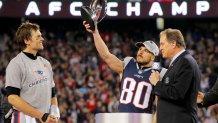 Jan 21, 2018; Foxborough, MA, USA; New England Patriots wide receiver Danny Amendola (80) holds up the Lamar Hunt Trophy after the AFC Championship Game against the Jacksonville Jaguars at Gillette Stadium. Mandatory Credit: David Butler II-USA TODAY Sports