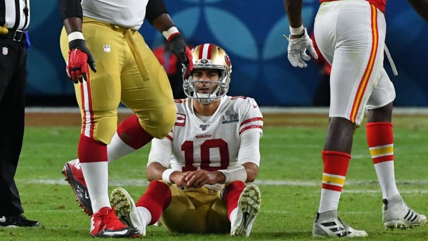 Feb 2, 2020; Miami Gardens, Florida, USA; San Francisco 49ers quarterback Jimmy Garoppolo (10) reacts after a sack in the fourth quarter against the Kansas City Chiefs in Super Bowl LIV at Hard Rock Stadium. Mandatory Credit: Robert Deutsch-USA TODAY Sports