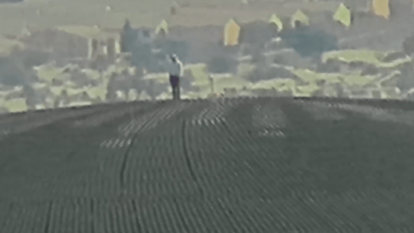 Man standing on top the Sphere in Las Vegas.