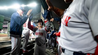 SEATTLE, WASHINGTON – MARCH 28: Tyler O’Neill #17 of the Boston Red Sox reacts in the dugout after hitting a home run during the eighth inning of the 2024 Opening Day game against the Seattle Mariners at T-Mobile Park on March 28, 2024 in Seattle, Washington. (Photo by Maddie Malhotra/Boston Red Sox/Getty Images)