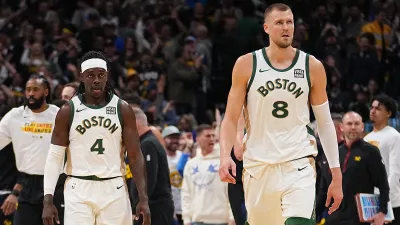 Celtics teammates Jrue Holiday and Kristaps Porzingis