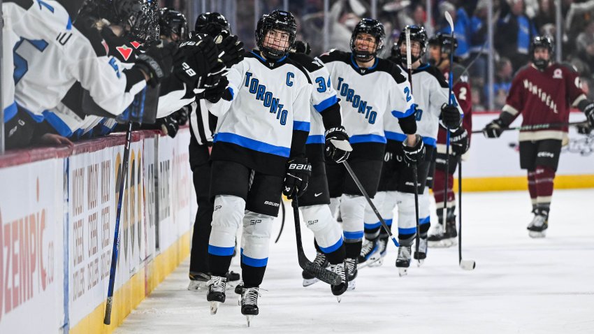 Toronto forward Blayre Turnbull (40) celebrates her goal with her teammates