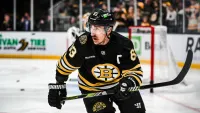 Latest updates on Bruins captain Brad Marchand's upper body injury