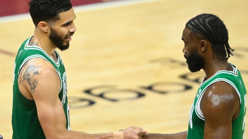 May 13, 2024; Cleveland, Ohio, USA; Boston Celtics forward Jayson Tatum (0) and guard Jaylen Brown (7) celebrate after a win over the Cleveland Cavaliers in game four of the second round for the 2024 NBA playoffs at Rocket Mortgage FieldHouse. Mandatory Credit: David Richard-USA TODAY Sports