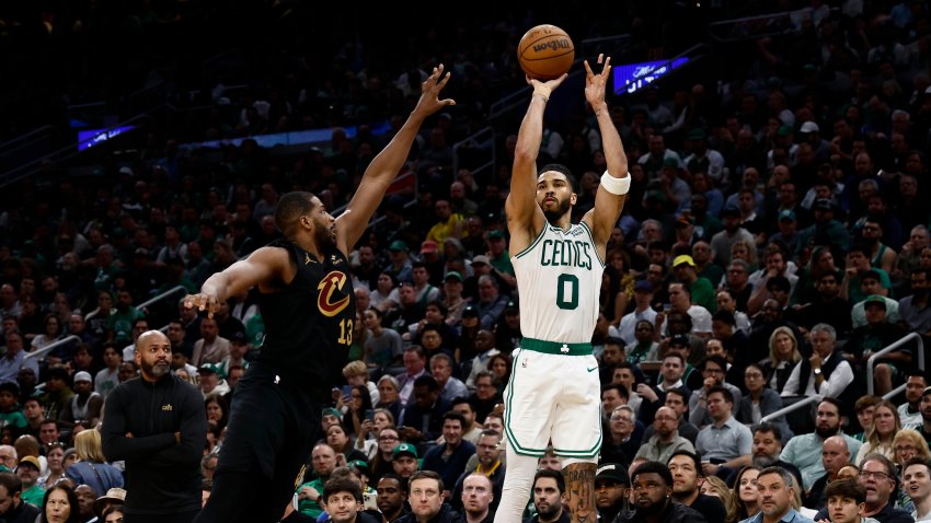 May 7, 2024; Boston, Massachusetts, USA; Boston Celtics forward Jayson Tatum (0) shoots against Cleveland Cavaliers center Tristan Thompson (13) during the third quarter of game one of the second round of the 2024 NBA playoffs at TD Garden. Mandatory Credit: Winslow Townson-USA TODAY Sports