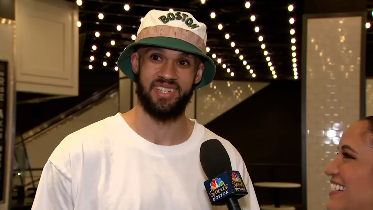 Derrick White arrives to Celtics’ parade with new teeth, awesome hat ...