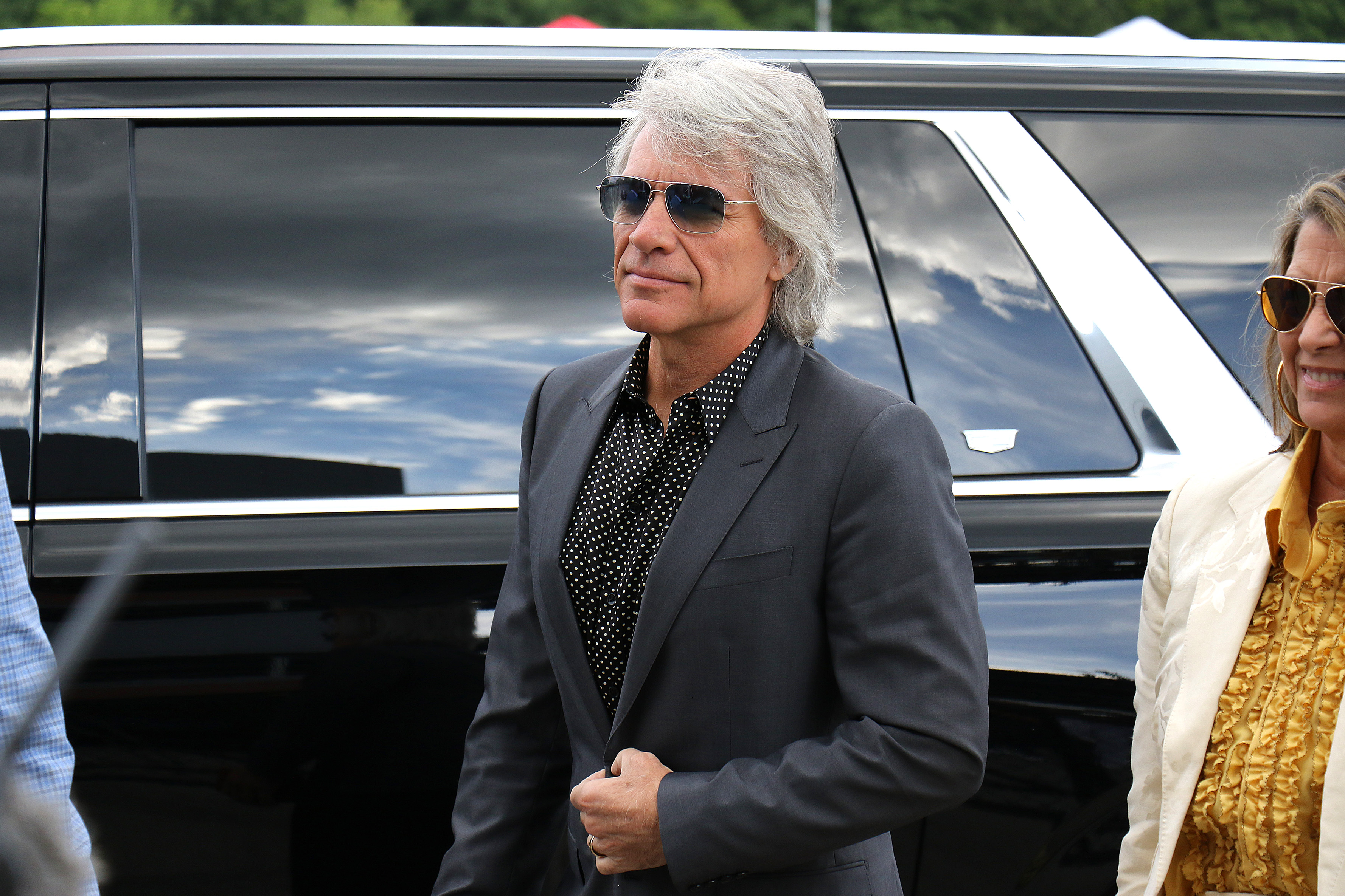 Singer Jon Bon Jovi arrives at former New England Patriots quarterback Tom Brady’s Hall of Fame induction at Gillette Stadium.