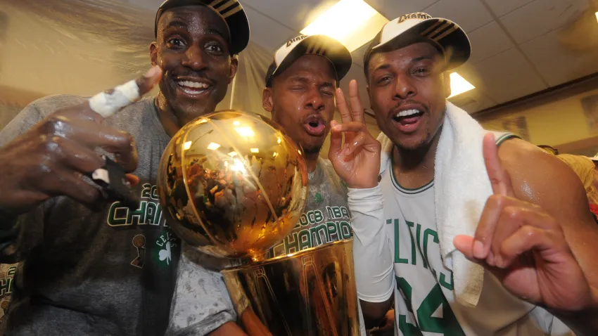 BOSTON – JUNE 17: Kevin Garnett #5, Ray Allen #20 and Paul Pierce #34 of the Boston Celtics pose for a photo with the NBA Champion trophy after defeating the Los Angeles Lakers during Game Six of the NBA Finals at the TD Banknorth Garden on June 17, 2008 in Boston, Massachusetts. NOTE TO USER: User expressly acknowledges and agrees that, by downloading and or using this photograph, User is consenting to the terms and conditions of the Getty Images License Agreement. Mandatory Copyright Notice: Copyright 2008 NBAE (Photo by Brian Babineau/NBAE via Getty Images)