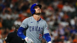BALTIMORE, MD β JULY 10: Cody Bellinger #24 of the Chicago Cubs reacts after being hit in the hand by a pitch in the seventh inning against the Baltimore Orioles at Oriole Park at Camden Yards on July 10, 2024 in Baltimore, Maryland. (Photo by Scott Taetsch/Getty Images)