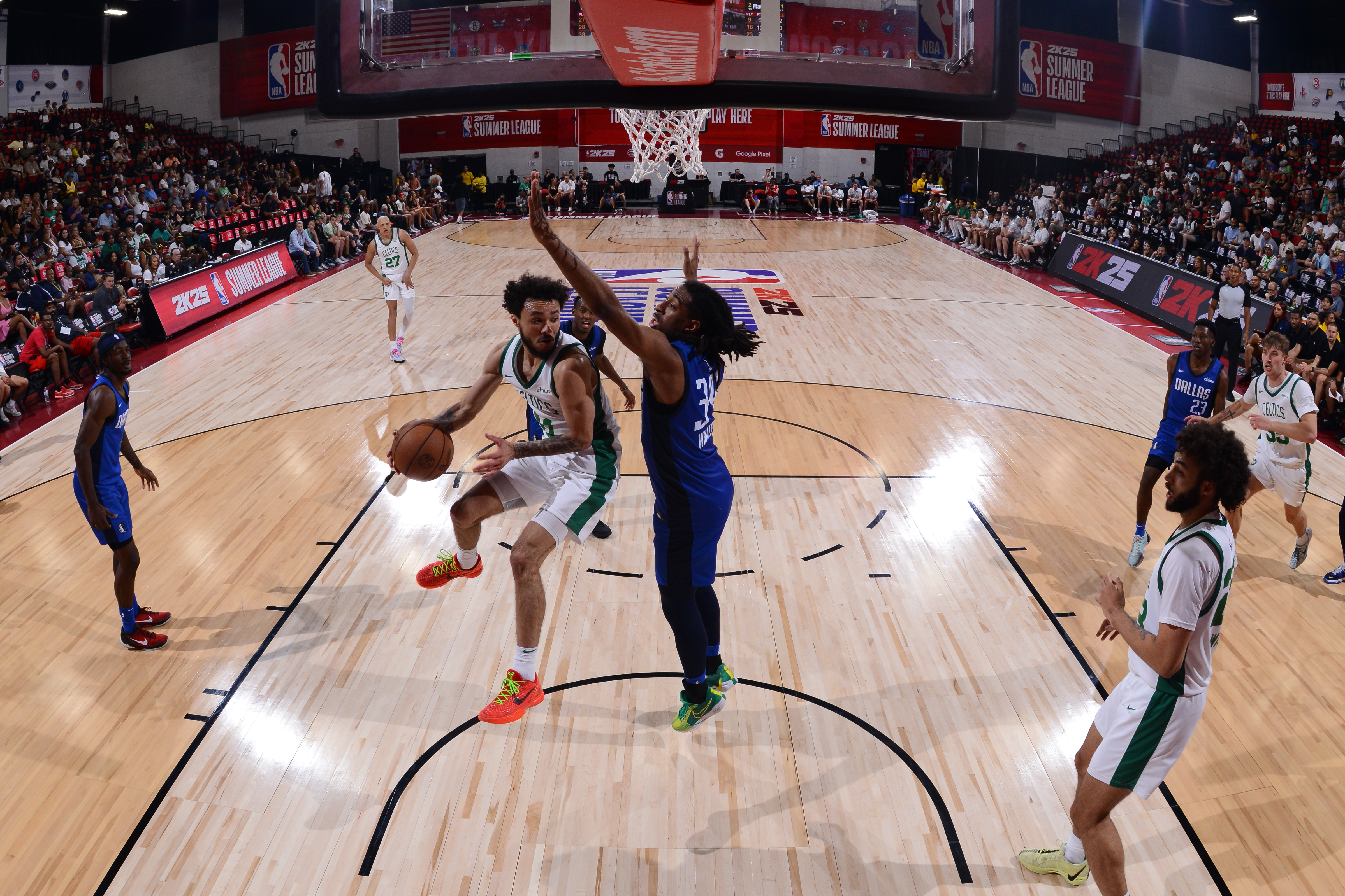Jaelen House #41 of the Boston Celtics passes the ball during the game against the Dallas Mavericks on July 19, 2024 at the Thomas & Mack Center in Las Vegas, Nevada.