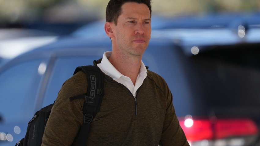 Mar 12, 2022; Mesa, AZ, USA; Chicago Cubs assistant general manager Craig Breslow arrives during a spring training workout at Sloan Park. Mandatory Credit: Joe Camporeale-USA TODAY Sports