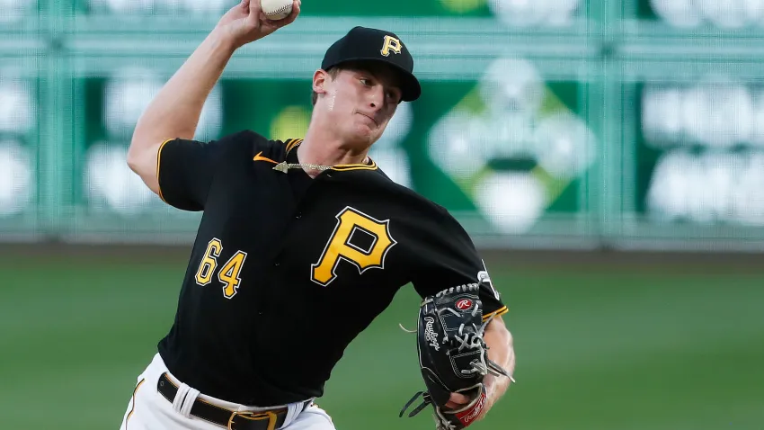 Sep 30, 2023; Pittsburgh, Pennsylvania, USA; Pittsburgh Pirates starting pitcher Quinn Priester (64) delivers a pitch against the Miami Marlins during the first inning at PNC Park. Mandatory Credit: Charles LeClaire-USA TODAY Sports