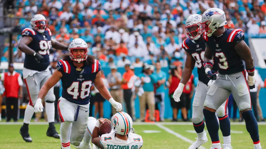 Oct 29, 2023; Miami Gardens, Florida, USA; New England Patriots linebacker Jahlani Tavai (48) reacts after a tackle against Miami Dolphins quarterback Tua Tagovailoa (1) during the fourth quarter at Hard Rock Stadium. Mandatory Credit: Sam Navarro-USA TODAY Sports