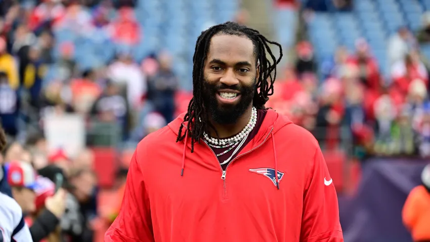 Dec 17, 2023; Foxborough, Massachusetts, USA; New England Patriots linebacker Matthew Judon (9) greets fans before a game against the Kansas City Chiefs at Gillette Stadium. Mandatory Credit: Eric Canha-USA TODAY Sports