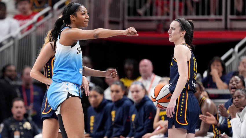 Angel Reese reacts after fouling Caitlin Clark