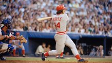 FILE - Pete Rose of the Cincinnati Reds in action at the bat against the Atlanta Braves in Atlanta, Aug. 2, 1978. At left is Atlanta catcher Joe Nolan. (AP Photo, File)