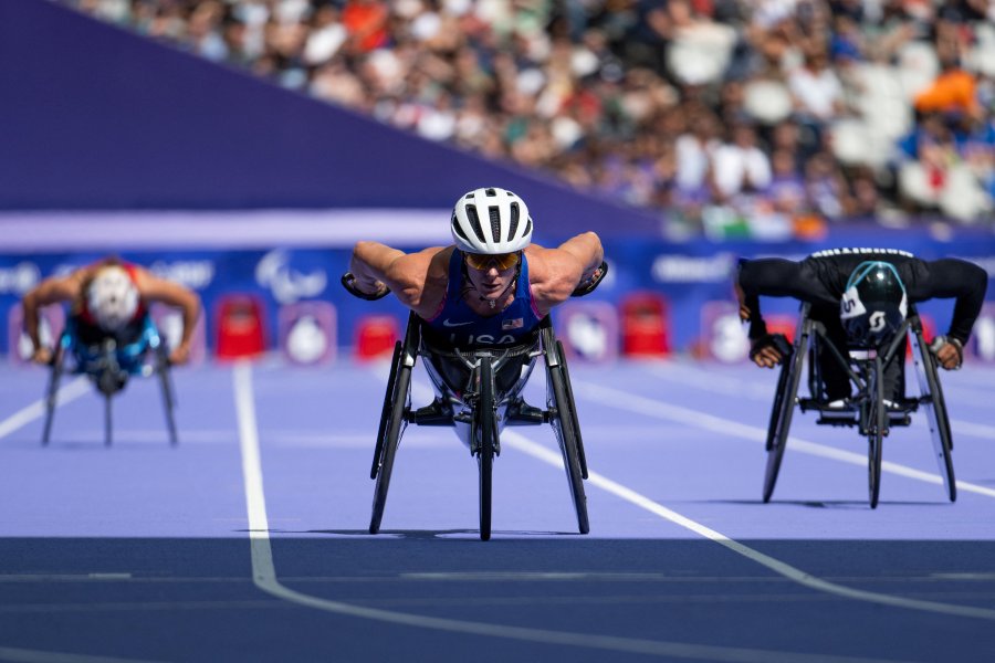 USA's Tatyana McFadden competes in a heat of the Paris 2024 Paralympics Women's T54 100 metres at the Stade de France in Saint-Denis outside Paris on September 4 2024