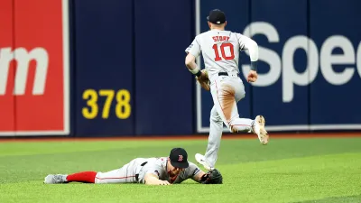 Red Sox outfielder Tyler O'Neill and shortstop Trevor Story