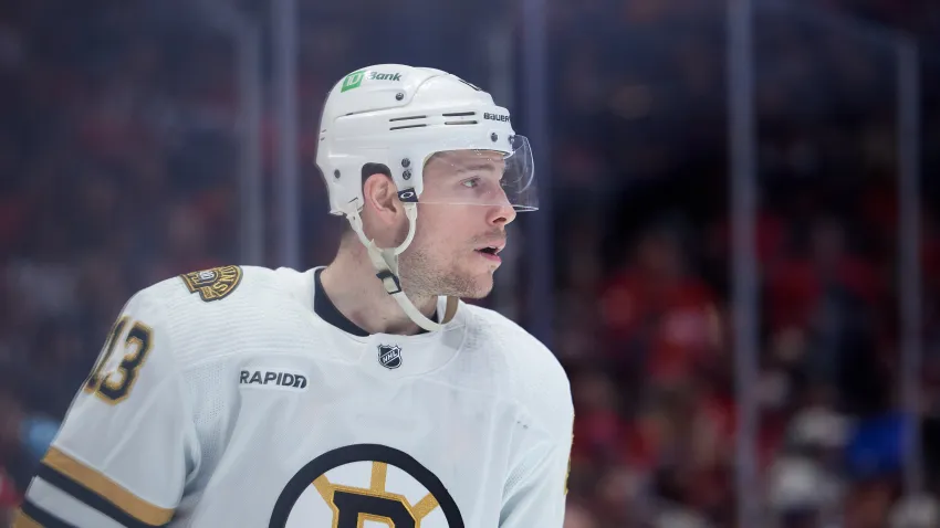 Mar 30, 2024; Washington, District of Columbia, USA; Boston Bruins center Charlie Coyle (13) prepares for a face-off against the Washington Capitals during the first period at Capital One Arena. Mandatory Credit: Hannah Foslien-USA TODAY Sports