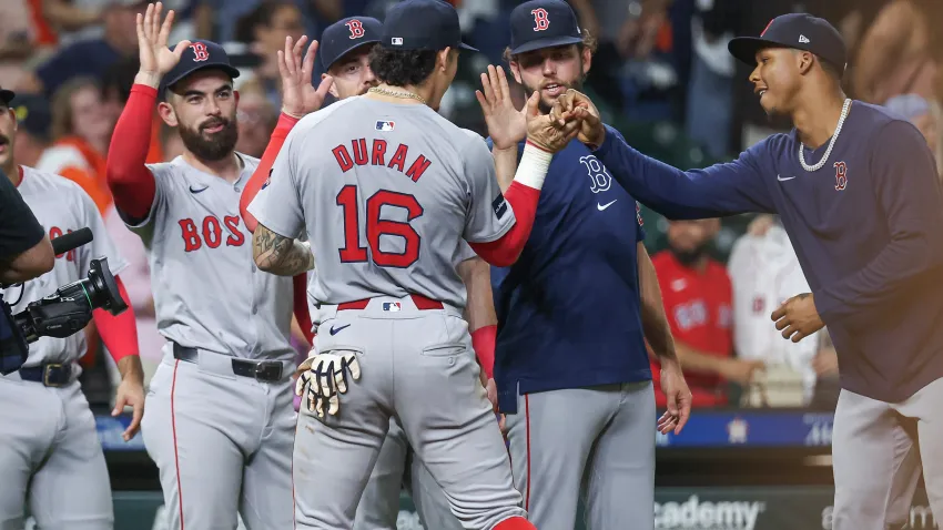 Aug 20, 2024; Houston, Texas, USA; Boston Red Sox center fielder Jarren Duran (16) celebrates with teammates after the game against the Houston Astros at Minute Maid Park. Mandatory Credit: Troy Taormina-USA TODAY Sports